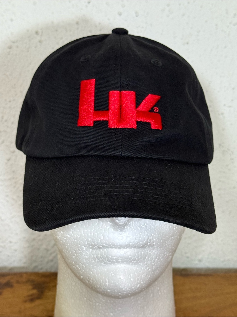 Heckler & Koch Black embroidered cap w/ HK logo and “No Compromise” on strap